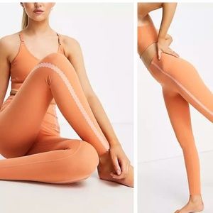Nike Yoga Luxe Eylet High Rise 7/8 Leggings Orange Women's Large